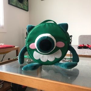 Monster round shoulder bag